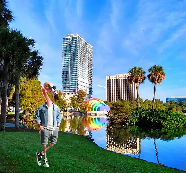 Anthropomorphic flamingo wearing a denim jacket and sunglasses in an urban park with a rainbow sculpture and city buildings in the background
